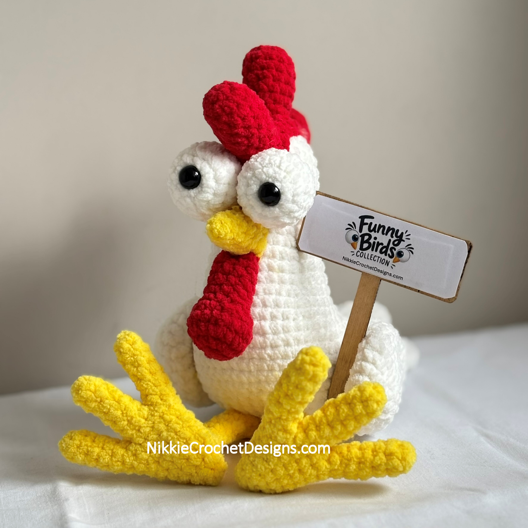 Cheeky Chicken holding a Funny Birds sign